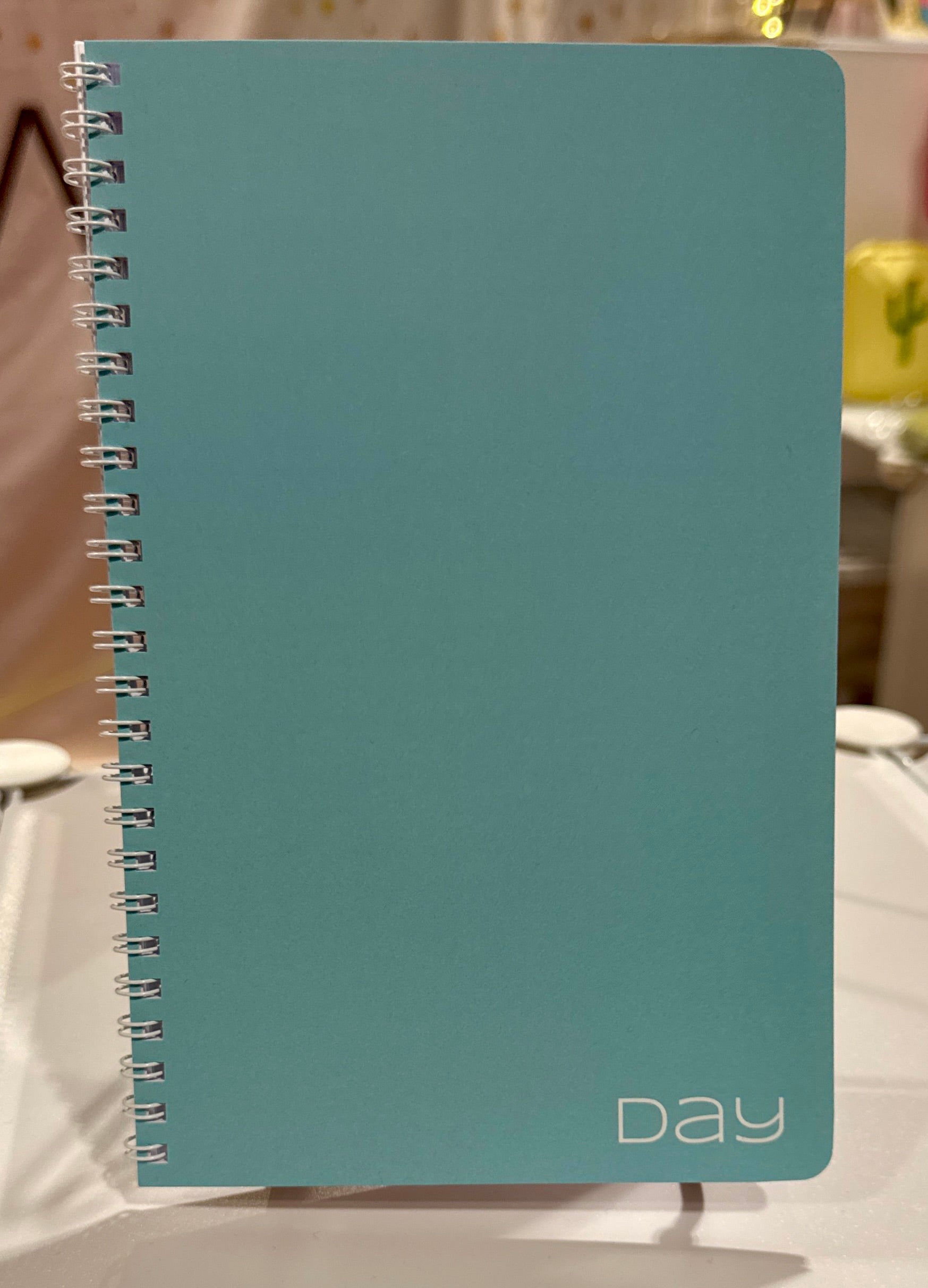 front cover of goals and gratitude journal upright photo display, journal for creatives