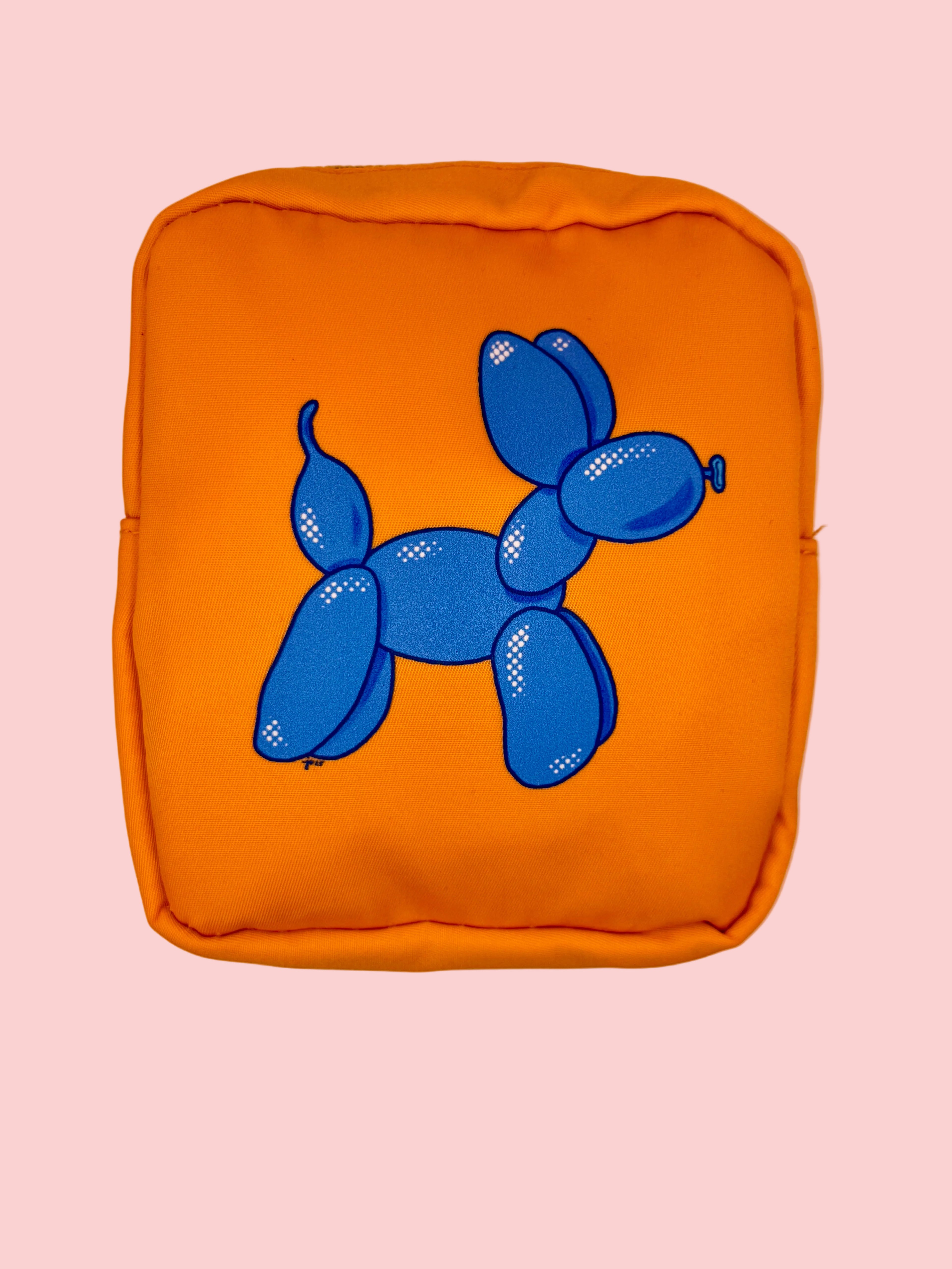 blue balloon dog illustration on an orange nylon case