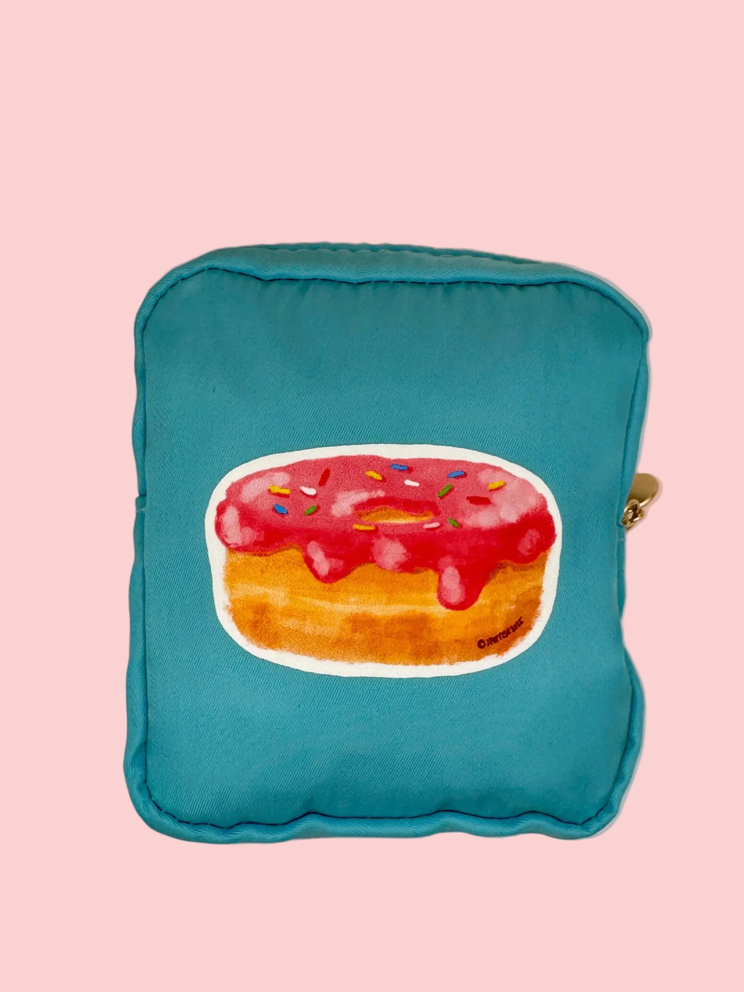 Pink frosted donut illustration on a light blue nylon zipper pouch