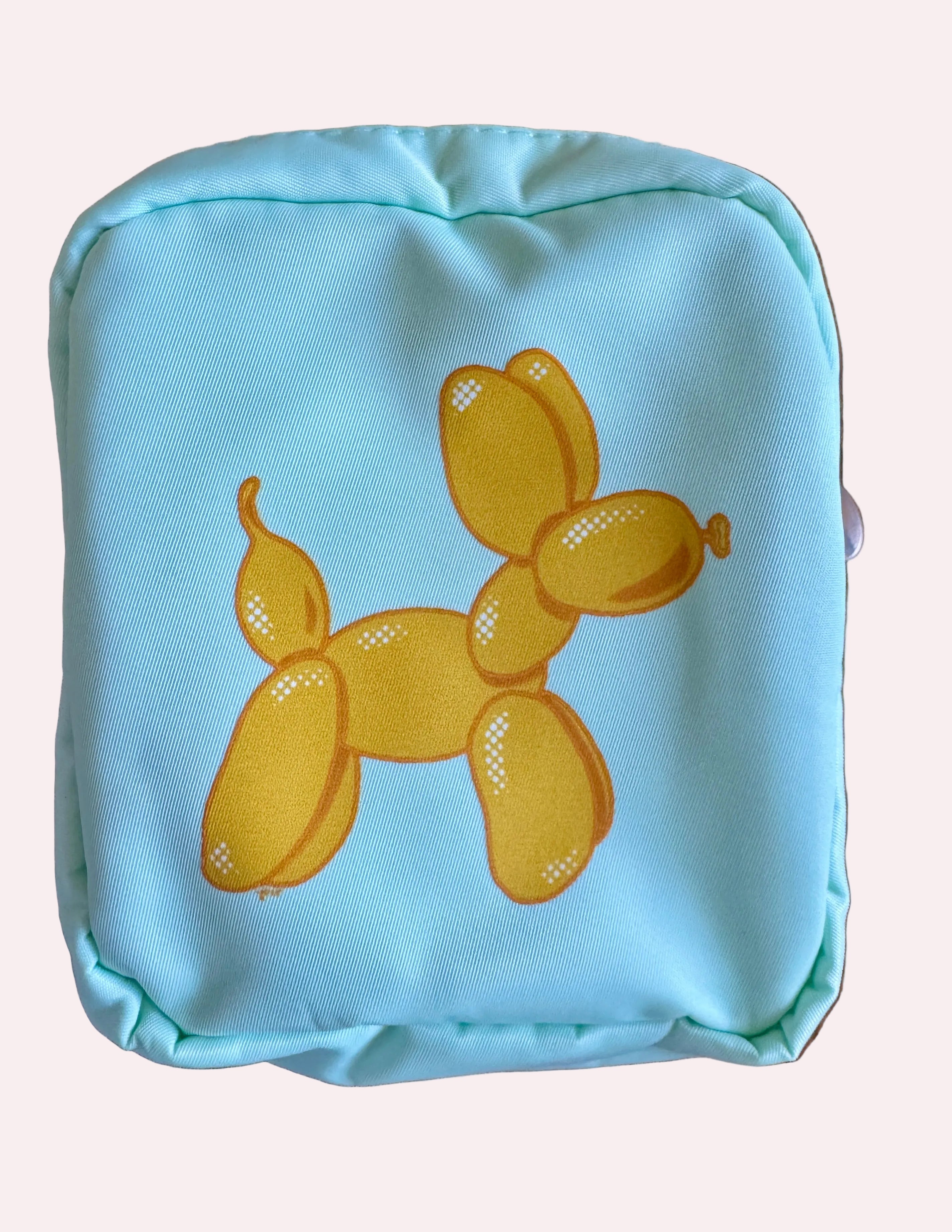 Light blue pouch with yellow balloon dog design