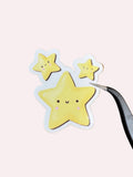 Star-shaped button on a wooden surface
