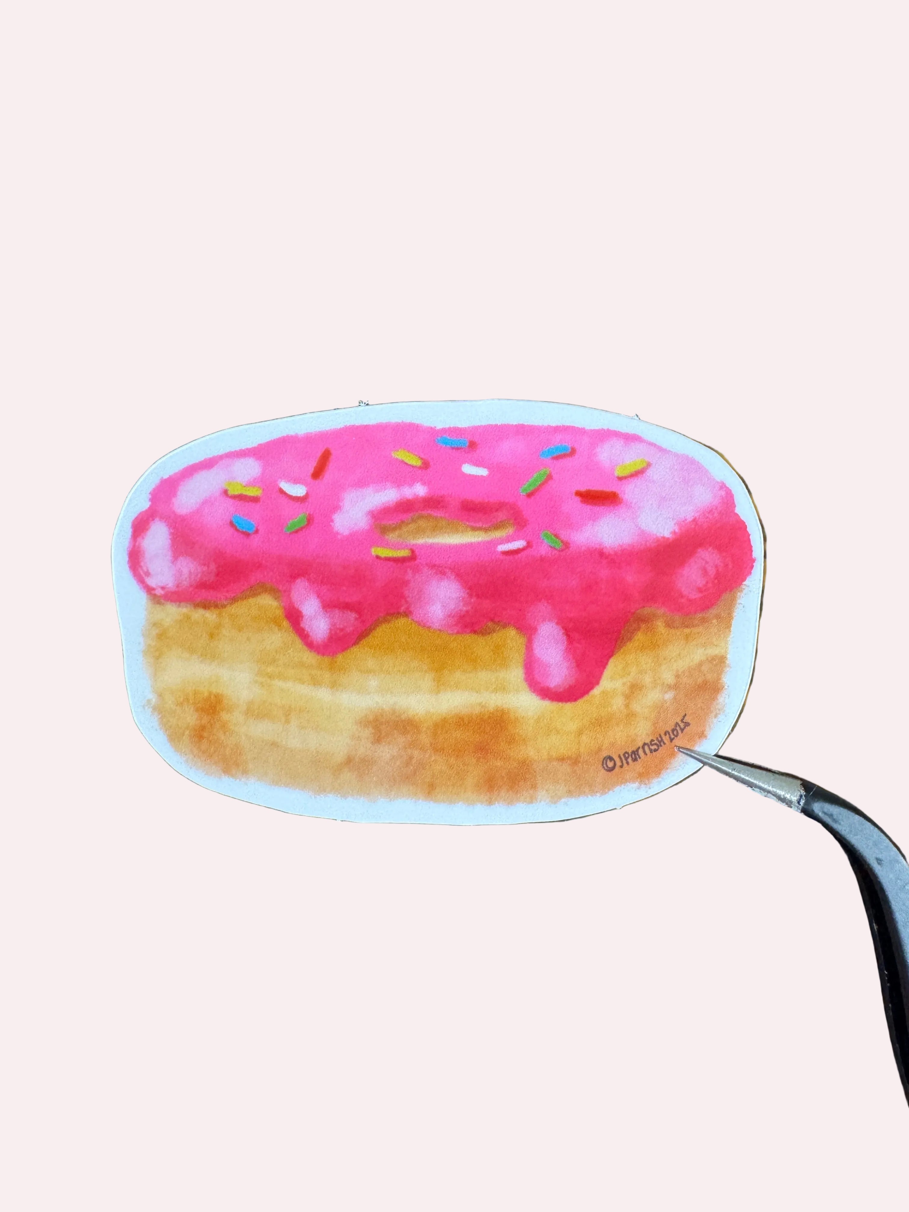 pink frosted donut with sprinkles glossy sticker
